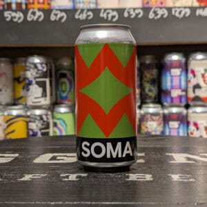 Frisdrank blik met Soma logo en kleurrijk design.