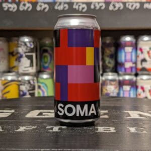 Frisdrank blik Soma met kleurrijk geometrisch ontwerp.