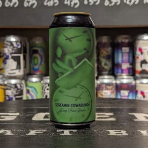 Craft bier in groene blik met lachende koe en tekst "Screaming Cowabunga".